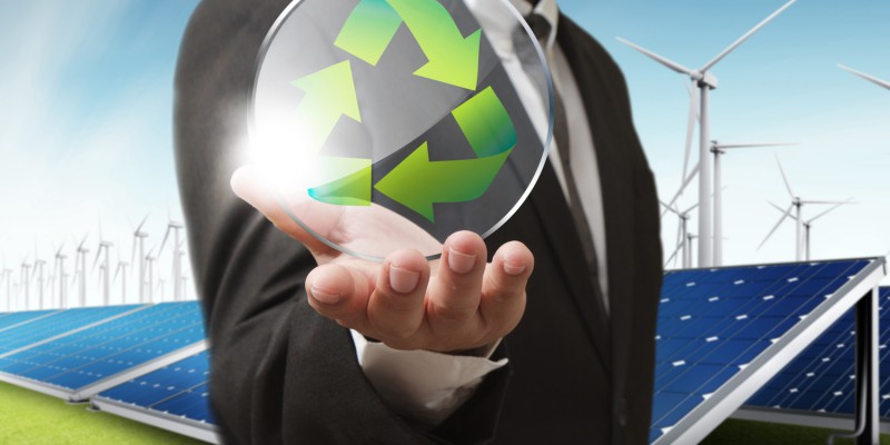 businesss man shows recycle glass shield as concept